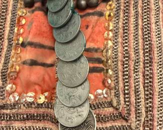 Nose piece of face veil made of coins