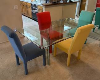 8 Colorful, Rainbow Chairs and Rectangular Glass Dining Table