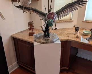 Metal art ducks in flight