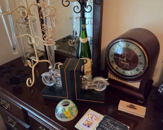 Antique clock, book ends, iron flower vases
