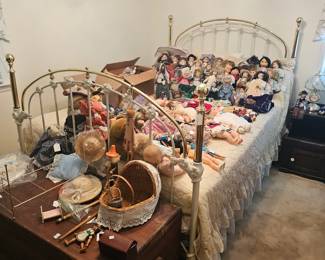 Iron Bed and Dolls