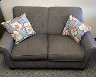 Overstuffed Upholstered Love Seat With Throw Pillows