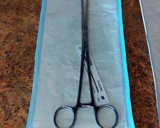 Stainless Steel Surgical Tools In Sterilization Pouches, Includes Forceps, Biopsy Curette, Uterine Probe, And Suction Curette