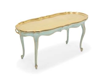 1108 A Louis XV style brass tray top coffee table 20th century Tray twice impressed: MADE IN GERMANY With scalloped edges, raised on a painted carved wood table frame with cabriole legs Tray: 44" W x 17.75" W; Table: 19.75" H x 42.75" W x 17.5" D Estimate: $400 - $600