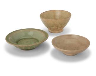 1340 Three East Asian celadon ceramic bowls 15th century or later Possibly Chinese Longquan wares 3 pieces Tallest: 2.375" H x 4.375" Dia.; Smallest: 1.375" H x 4.25" Dia. Estimate: $200 - $300