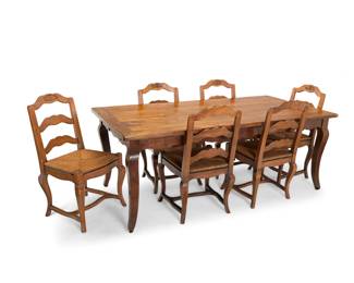 1152 A French Provincial style carved walnut dining set 20th century The farmhouse table with six side chairs, each carved with floral elements to crest rail above a woven seat, raised on curved legs joined by an H-stretcher 7 pieces Table: 30" H x 78.5" W x 40" D; Each chair: 37.5" H x 21" W x 21.5" D Estimate: $700 - $900