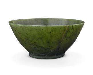 1306 A Chinese nephrite jade bowl 20th century Unmarked 2.625" H x 5.625" Dia. Estimate: $200 - $300
