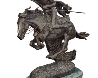 1051 After Frederic Remington (1861-1909) "The Cheyenne," modeled 1901 Patinated bronze on marble base Signed in the casting: Copyright by Frederic Remington Bronze: 18.25" H x 21.5" W x 8" D; Overall: 19.5" H x 21.5" W x 9" D Estimate: $300 - $500