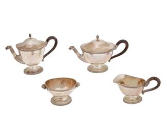 1003 A Continental .800 silver tea and coffee service Early/mid-20th century Each marked: 800 / 204M Comprising: Teapot (5.5" H x 8.75" W x 3.875" D) Coffee pot (6" H x 7.75" W x 3.375" D) Open sugar (2.75" H x 4.75" W x 3" D) Creamer (3.625" H x 6.125" W x 2.875" D) 4 pieces Total weight: 36.6 gross oz. troy approximately Estimate: $700 - $900