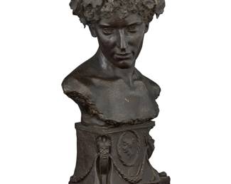 1075 A Continental patinated cast plaster bust First half 20th century Inscribed indistinctly, possibly reading: B ANGLE On a wood base Overall: 24.5" H x 13.75" W x 8.5" D Estimate: $300 - $500