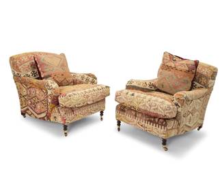 1107 A pair of George Smith Kilim textile upholstered club chairs Late 20th century Each with metal tag: GEORGE SMITH / HANDMADE BY CRAFTSMEN / NEWCASTLE ENGLAND Raised on brass casters 2 pieces Each: 34" H x 32.5" W x 45" D Estimate: $600 - $800