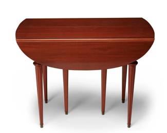 1154 A George III style fruitwood pembroke table Early/mid-20th century Applied with a paper label: John Widdicomb Co. / Maker of Fine Furniture / Grand Rapids; further marked with the model number: 125 With rounded edges and set on six fluted tapered legs with brass feet Open: 29.25" H x 39" W x 37.5" D; Stored: 29.25" H x 39" W x 21.5" D Estimate: $400 - $600