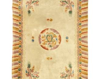 1371 A Chinese rug 20th century Signed in the weaving at one corner; stamped verso Wool on cotton foundation 8' L x 5' W Estimate: $600 - $800