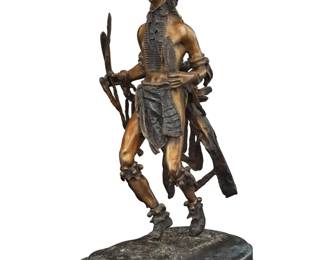 1073 After Frederic Remington (1861-1909) "Indian Dancer" Patinated and polished bronze on marble plinth Edition: 2/10 Signed and numbered in the casting: Frederic Remington; with applied metal label: MGM STUDIO PROPERTY CULVER CITY CAL Bronze: 19.625" H x 10.75" W x 6.75" D; Overall: 20.75" H x 15.75" W x 8.25" D Estimate: $300 - $500
