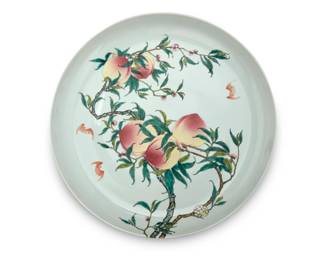 1266 A large Chinese porcelain nine peach charger Likely Republic Period (1912-1949) or later Bearing an apocryphal reign mark for Yongzheng Period (1723-1735) Depicting five peaches to interior and four to exterior, with bats 3.125" H x 20.25" Dia. Estimate: $1,000 - $2,000