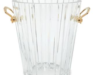 1010 A Baccarat glass 'Harmonie' champagne bucket Late 20th century With etched factory mark With gilt metal handles, with factory box Bucket: 9.125" H x 10.25" W x 8.25" D; Box: 12.75" H x 10.25" W x 10" D Estimate: $200 - $400