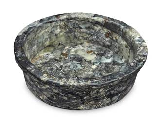 1358 A Chinese carved hardstone fishbowl 20th century With incised floral decoration to the exterior and lotus motif to the interior 5.5" H x 16.625" Dia. Estimate: $200 - $300