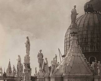 1034 Laure Albin-Guillot (1879-1962) "Roof Top of French Church," circa 1950 Print on paper Appears unsigned; titled and dated on a typed label affixed to the frame's backing paper Sight: 14 1/2 x 11 1/2in Estimate: $400 - $600