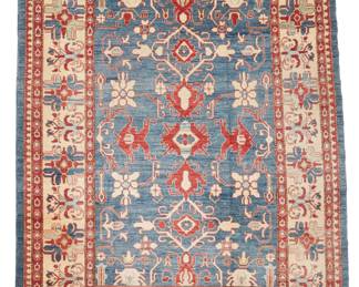 1367 An Indo Persian rug Mid-20th century Wool on wool with geometric floral motifs 11' 10" L x 9' 1" W Estimate: $400 - $600