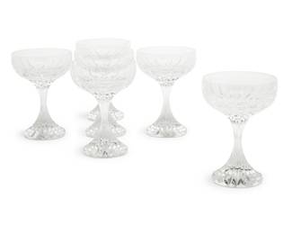 1008 A set of six Baccarat glass 'Massena' champagne coupes 20th century Each with etched factory mark 6 pieces Each: 5.5" H x 4" Dia. Estimate: $300 - $500