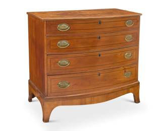 1120 A Federal style chest of four drawers 20th century Each drawer with brass locking mechanism and pull 33.75" H x 39" W x 21.5" D Estimate: $300 - $500