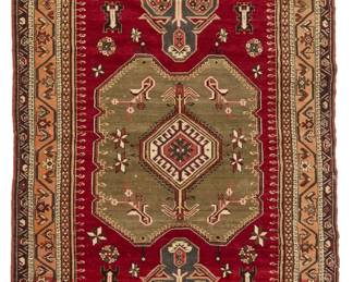 1369 A Turkish rug Mid-20th century Wool on cotton foundation 10' 4" L x 4' 10" W Estimate: $300 - $500