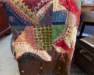 Another quilt ....crazy quilt with embroidery on patched edges.  Does show wear and some damaged . Priced accordingly.