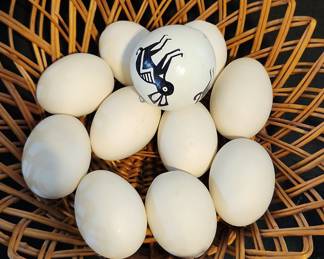 Decorative Painted Eggs in Wicker Basket