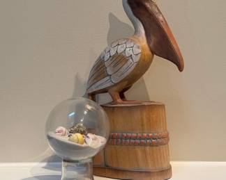 Carved Wooden Pelican on Piling with Seashell Display Globe