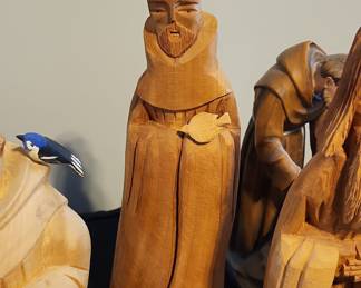 Carved Wooden Monk Figurines with Bird