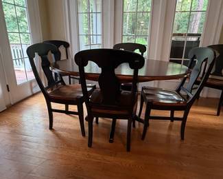 Black and Cherry Finish Oval Dining Table Set