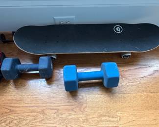 World Industries Skateboard and Neoprene Dumbbells
