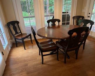 Black and Cherry Finish Oval Dining Table Set