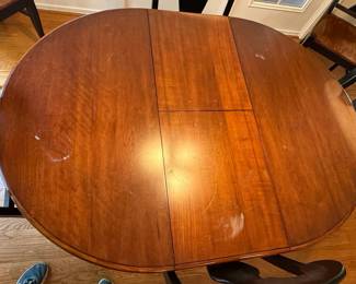 Black and Cherry Finish Oval Dining Table Set