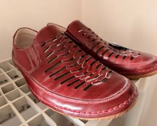 Many pairs of leather shoes. Around sizes 10-11