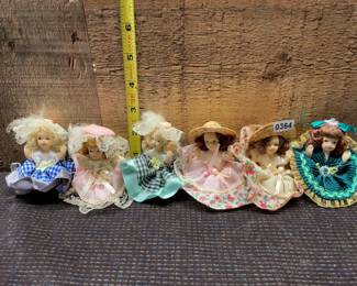 Six mini porcelain dolls