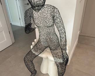 Designer Figure on Chair
