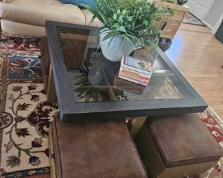 unique coffee table with 4 ottomans that store under table, they are extra setting and storage