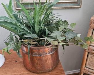 brass pot with artificial greenery