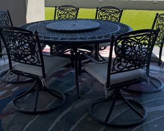 Patio Table w La-Z-Susan and 6 Swivel Chairs