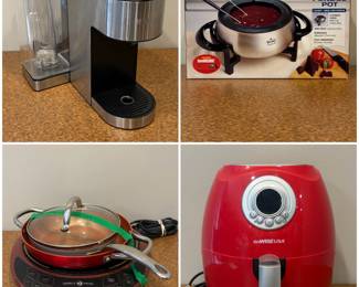 A Keurig K-Supreme Plus Coffee Maker, a Simply Ming 1800W Induction Burner with a 9.5" red fry pan, a Rival Select Stainless Steel Electric Fondue Pot, and a GoWISE USA digital air fryer.