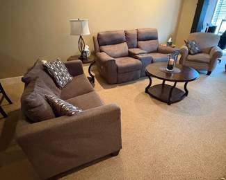 Loves seats, one chenille and other leather power reclining with adjustable head rests, coffee table and end tables