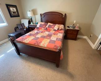Full size bed frame with mattress, 2 nightstands and a matching dresser with mirror. 