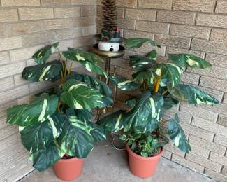 fake plants, plant stand, snowman bird house