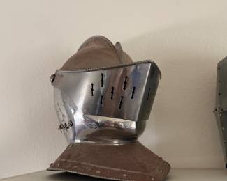 pig-faced bascinet (also known as a houndskull or hounskull bascinet), a type of medieval knightly helmet from the 14th century.