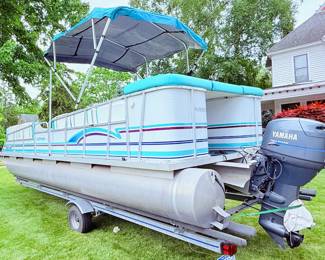 1998 Playbouy Pontoon Boat 24’ with galvanized steel trailer