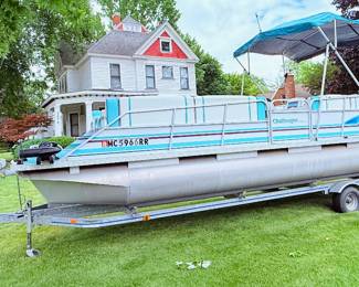 1998 Playbouy Pontoon Boat 24’ with galvanized steel trailer