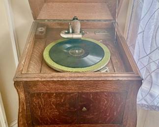 Quarter sawn oak record player in working order.