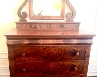 Mahogany dresser with mirror.