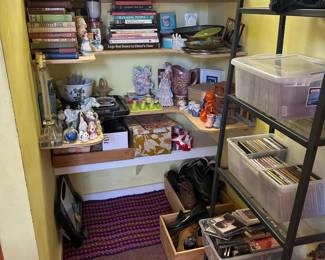Books, little dog figurines, salt and pepper, drummer girl, bun warmer, ice bucket, paperweight, cake risers, CDs